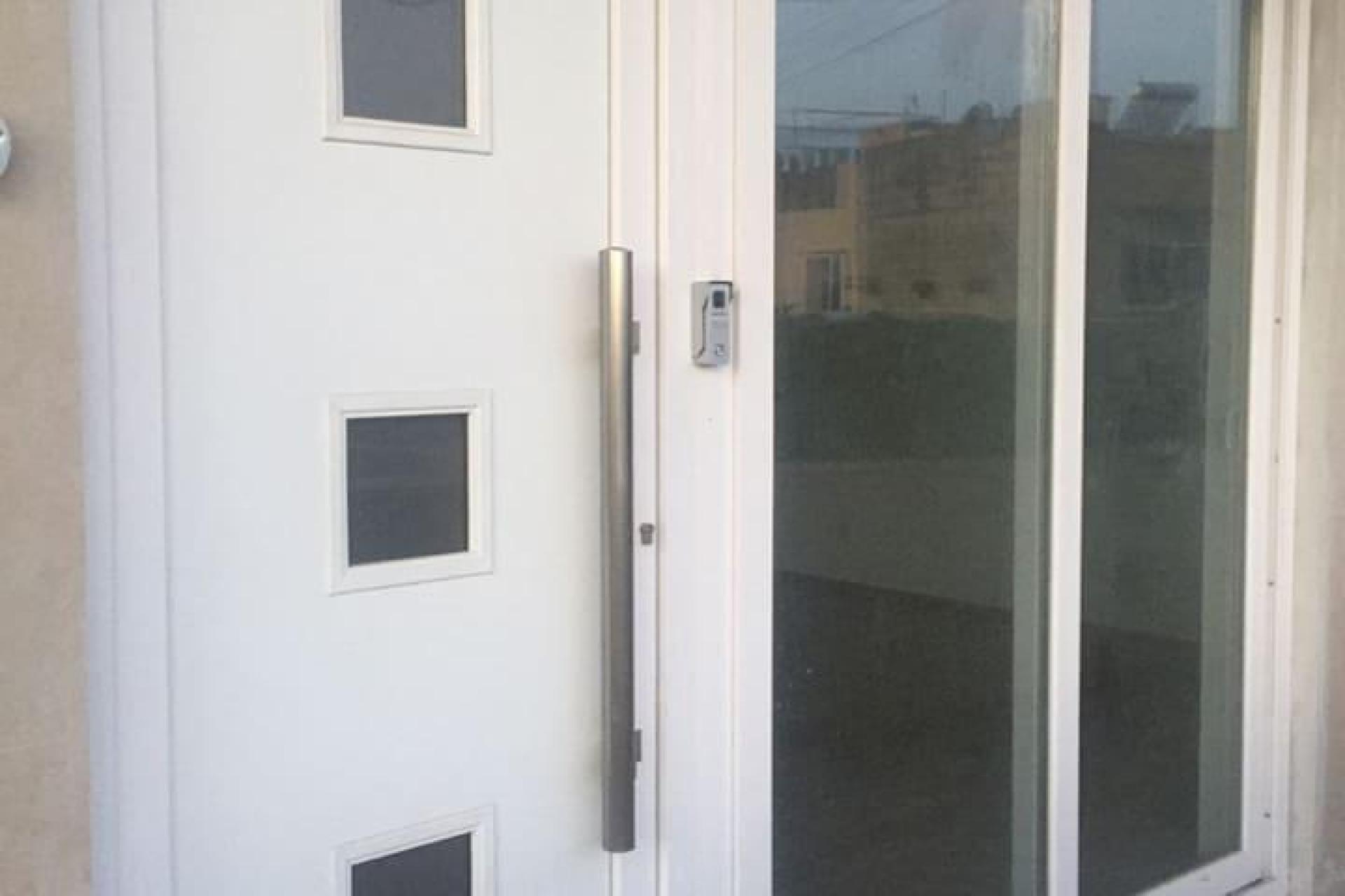 Front door with square windows